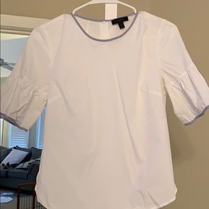 White with blue stripe top